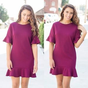 Adorable ruffled hem and sleeve boutique dress